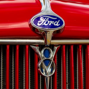 Vintage Ford V8 Logo on a Red Street Rod Hood