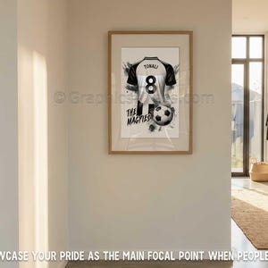 May include: A white ceramic mug with a black handle and the text "But First, Coffee" in a handwritten style. The mug is on a white surface.