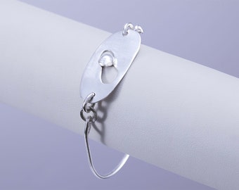 Elegant and original sterling silver bracelet with oval geometric face, the perfect gift