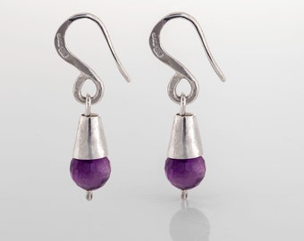 Cone shaped silver dangle earrings with amethyst stone. Stunning one of a kind earrings ideal for evening wear and a perfect gift for her