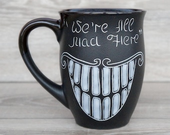 Hand Painted Black Ceramic Mug with Mysterious Smile, 16 oz Coffee Cup, Fantasy Pottery Mug, Unique Ceramic Tea Cup, Gothic Kitchen Gift