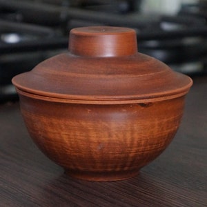 May include: A handmade wooden sign with the text "Welcome" in a playful font. The sign features a distressed white background and a dark brown frame, perfect for a front door or entryway. The sign measures approximately 12 inches wide and 6 inches tall.