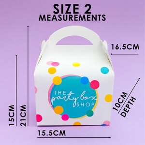 May include: White party favor box with a handle, featuring colorful polka dots and the text "The Party Box Shop." Measurements are 15 cm high, 21 cm tall, 15.5 cm wide, and 10 cm deep, with a width of 16.5 cm. The box is size 2.