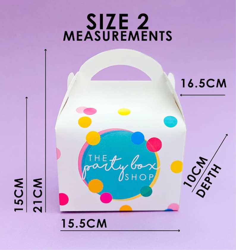May include: White party favor box with a handle, featuring colorful polka dots and the text "The Party Box Shop." Measurements are 15 cm high, 21 cm tall, 15.5 cm wide, and 10 cm deep, with a width of 16.5 cm. The box is size 2.