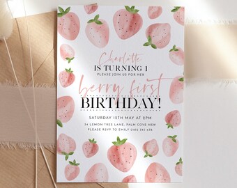May include: Pink and white birthday invitation with a watercolor strawberry pattern. The text reads "Charlotte is turning 1. Please join us for her berry first birthday! Saturday 12th May at 2pm. 34 Lemon Tree Lane, Palm Cove NSW. Please RSVP to Emily 0412 345-6786."