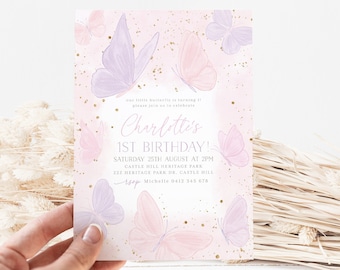 May include: A pink and purple butterfly-themed first birthday party invitation with gold glitter accents. The invitation reads "Our little butterfly is turning 1! Please join us to celebrate Charlotte's 1st Birthday! Saturday 25th August at 2pm Castle Hill Heritage Park 227 Heritage Park Dr. Castle Hill Michelle 0412 345 678"