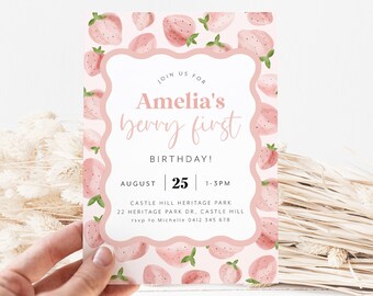 May include: Pink invitation with a strawberry pattern. The text reads "Join us for Amelia's berry first birthday! August 25 | 1-3PM Castle Hill Heritage Park 22 Heritage Park Dr, Castle Hill rsvp to Michelle 0412 345 678"