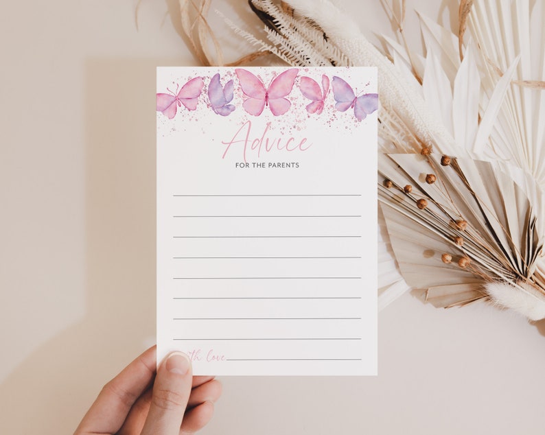 Op de afbeelding: Een witte kaart met een roze en paarse aquarel vlinder rand. De kaart zegt "Advies voor de ouders" en heeft lijnen om op te schrijven.