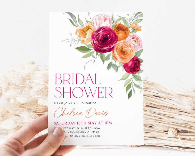 May include: A bridal shower invitation with a watercolor floral design in shades of pink, orange, and red. The text reads "BRIDAL SHOWER" in a bold, red font. The invitation is for Chelsea Davis and includes the date, time, and location of the event.