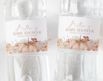May include: Two clear plastic water bottles with labels that say "Bella's Baby Shower Thanks for Coming!" The labels feature a watercolor illustration of a pumpkin with fall foliage.