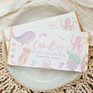 Könnte beinhalten: Ein rosa-blauer Babyparty-Favor mit einem Wal, einem Oktopus, einer Schildkröte und einer Qualle. Der Text lautet "Camilla's Baby Shower Thanks for Coming!"