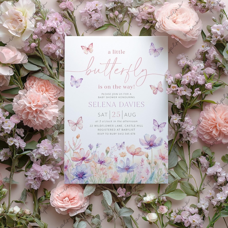 May include: A baby shower invitation with a watercolor illustration of butterflies and flowers. The text reads "a little butterfly is on the way!" and includes the date and time of the event, the guest of honor's name, and the address.
