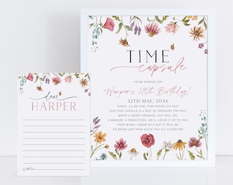 May include: A white frame with a floral border and the text "TIME capsule TO BE OPENED ON Harper's 18th Birthday! 12TH MAY, 2044 TODAY I'LL BE ONE, TIME PASSES SO FAST. THIS TIME CAPSULE IS A WAY TO TREASURE THE PAST. WRITE A SWEET MESSAGE, ANY WILL DO A MEMORY, A PREDICTION, WE'LL LEAVE IT UP TO YOU. THEN WHEN I GROW UP A GIFT IT WILL BE. TO KNOW JUST HOW MUCH YOU ALL LOVED ME" and a smaller card with the text "dear HARPER" and a lined space for writing.
