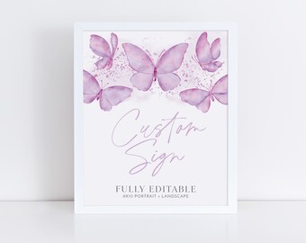 May include: A framed print featuring watercolor butterflies in shades of purple. The words "Custom Sign" are written in a delicate script, with the text "FULLY EDITABLE" and "8x10 PORTRAIT + LANDSCAPE" below. The artwork is set against a white background.