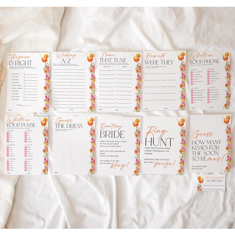 Puede incluir: Un conjunto de tarjetas de juegos para despedida de soltera en blanco, con bordes florales e ilustraciones de c&oacute;cteles. Los juegos incluyen "The Price is Right", "Wedding A-Z" y "Guess How Many Kisses".