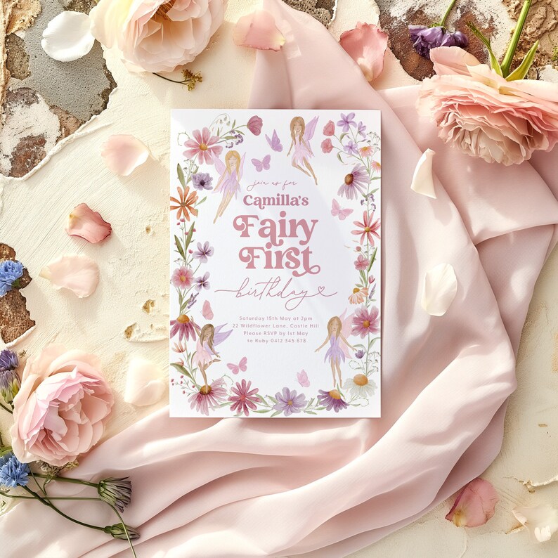 May include: A pink and white invitation card with a floral border and a fairy theme. The text reads "Join us for Camilla's Fairy First Birthday".