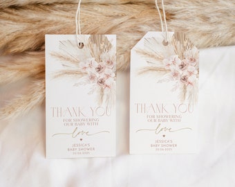 May include: Two beige thank you tags with a floral design and the text "Thank you for showering our baby with love Jessica's Baby Shower 30.06.2025"