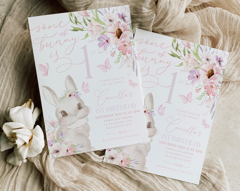 May include: Two invitations with a bunny theme. The invitations feature a watercolor illustration of a bunny, flowers, and butterflies. The text reads "Some bunny is 1" and includes details for a first birthday celebration.