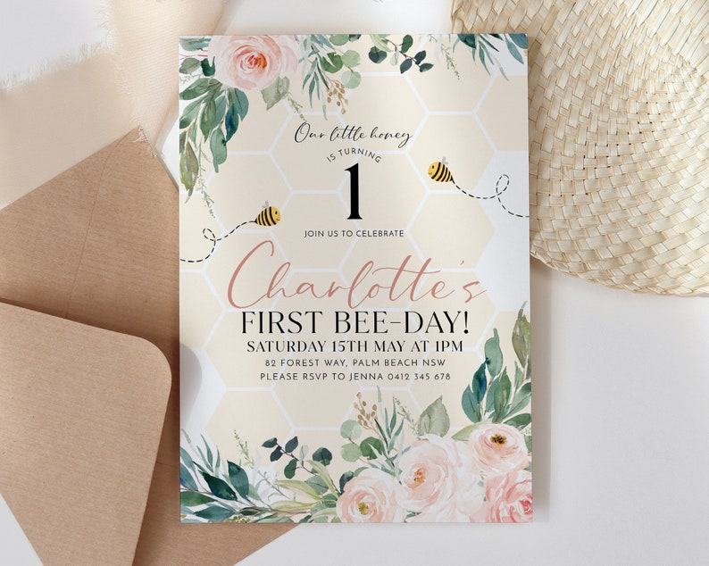 May include: A light beige invitation with floral and bee illustrations. The text reads "Our little honey is turning 1" and "Charlotte's First Bee-Day!" with event details. The design includes watercolor roses and greenery.
