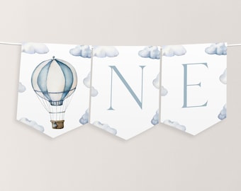 May include: A white banner with blue watercolor clouds and the word "ONE" in blue letters. The first flag features a blue and white hot air balloon.