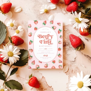 May include: A pink and white invitation with a strawberry pattern. The text reads "Join us for Isabella's Berry First Birthday! Sat 19 Aug at 2 o'clock in the afternoon Isabella's House 23 Strawberry Lane, Castle Hill RSVP to Ruby 8412 345 678 by Aug 1st"