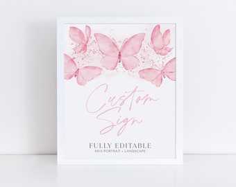 May include: A white frame with a pink watercolor butterfly design. The text "Custom Sign" is written in cursive script. The text "FULLY EDITABLE 8x10 PORTRAIT - LANDSCAPE" is written in black text.
