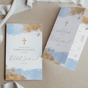 May include: A blue and gold watercolor design with a gold cross and the text "Welcome to the Christening of our son Koleb Samuel 16.03.2024".