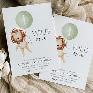 May include: A light green balloon with the number "1" on it is held by a cartoon lion with a red mane. The text "WILD one" is printed in black on the invitation. The invitation is for Oliver's 1st birthday party.