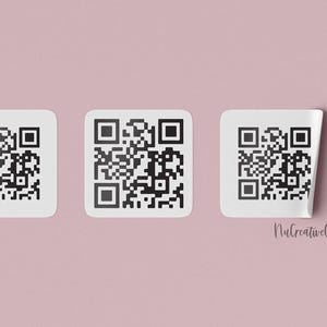 a row of white square stickers with black QR codes on them, arranged against a pink background.