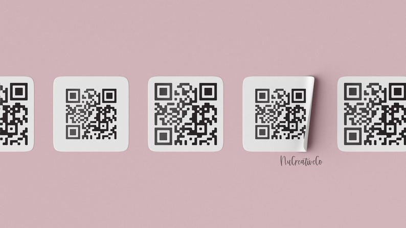 a row of white square stickers with black QR codes on them, arranged against a pink background.