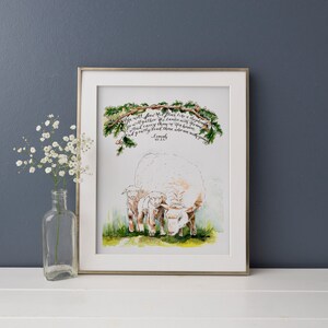 May include: A watercolor painting of a white sheep and two lambs with a green leafy branch above them. The painting includes the text "He will feed His flock like a shepherd. He will gather the lambs in His arms and carry them close to His heart; gently will He lead those that are with young." - Isaiah 40:11