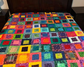 Batik king size quilt in block in a block pattern