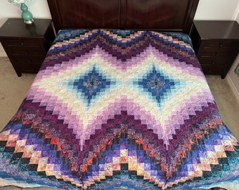 Double pointed handmade quilt in king size