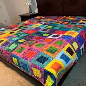 Batik king size quilt in block in a block pattern image 4