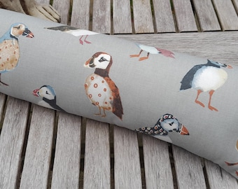 Draught Excluder in Puffin print soft furnishing fabric