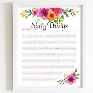 May include: A framed print with the text "Sixty Things We Love About You" in a decorative font, surrounded by watercolor floral accents in pink, orange, and yellow. The text is a list of loving sentiments.