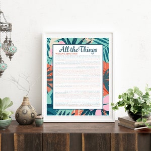 May include: A framed print with a tropical leaf design and the text "All the Things We Love About You".