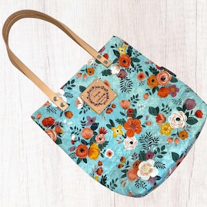 Bolsa cristã acolchoada com alças de couro legítimo e versículo bíblico