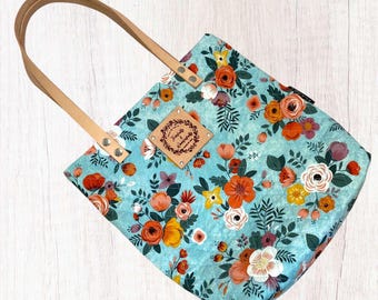 Bolso cristiano acolchado con asas de cuero genuino y versículo bíblico.