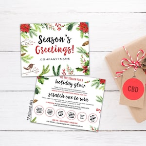 May include: A holiday-themed postcard with a festive red and green design. The postcard features a watercolor illustration of a bird, pine branches, and poinsettias. The text on the postcard reads "Season's Greetings!" and "Tis the season for a holiday glow". The postcard also includes a scratch-off area with the text "Scratch one to win".