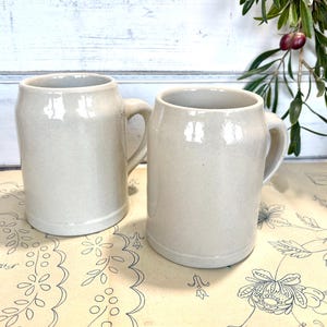 Vintage French stoneware beer stein. Set of 2 primitive pottery cups, farmhouse decor, antique bottles, French antique pottery vase, rustic