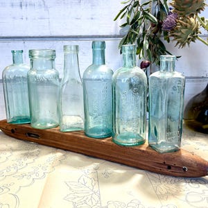 Vintage green blue glass collectible bottles, poison bottles, pharmacy chemist, bottle display, antique glass bottles, wedding bud vase,