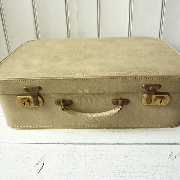 Vintage English faux snakeskin vanity suitcase.
