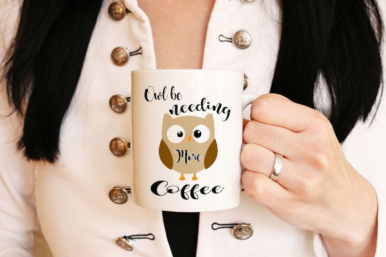 May include: White ceramic coffee mug with a brown owl illustration and the text "Owl be needing more coffee".