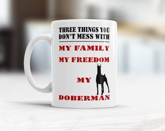 Doberman owner gift Statement Coffee Mug Three things you don’t mess with My family My freedom My Doberman Dog lover Valentines Gift