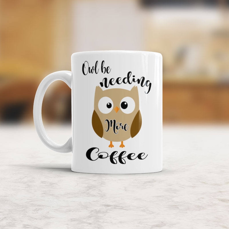 May include: White ceramic coffee mug with a brown owl illustration and the text "Owl be needing more coffee".