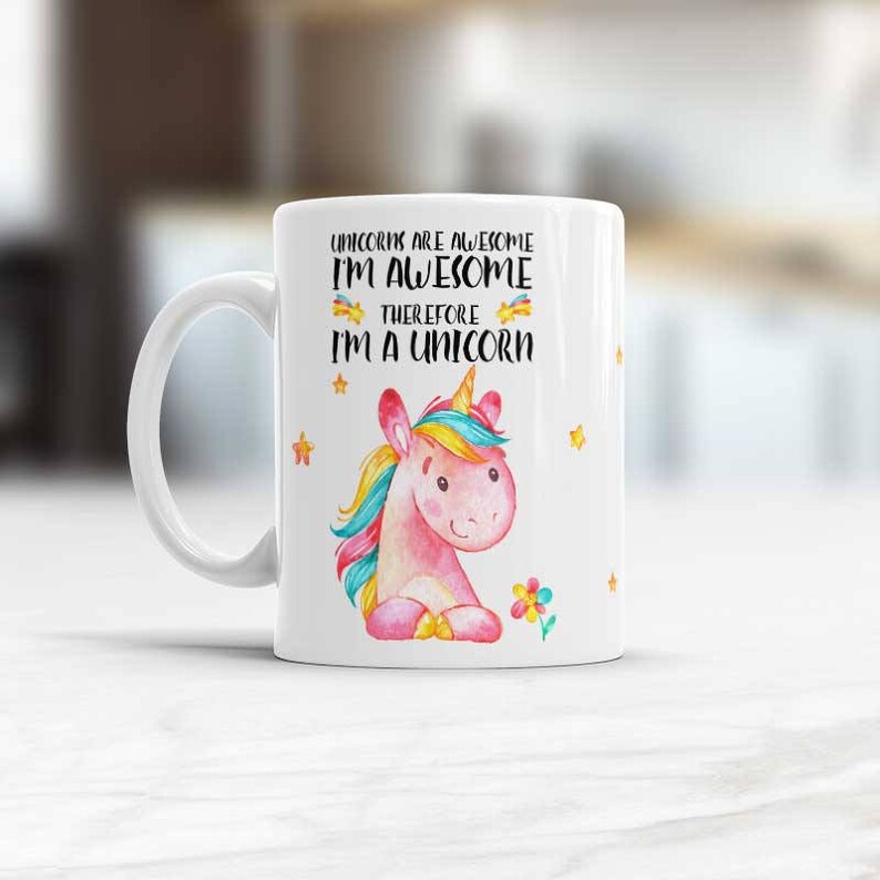 May include: White ceramic mug with a pink unicorn illustration and the text "Unicorns are awesome I'm awesome therefore I'm a unicorn".
