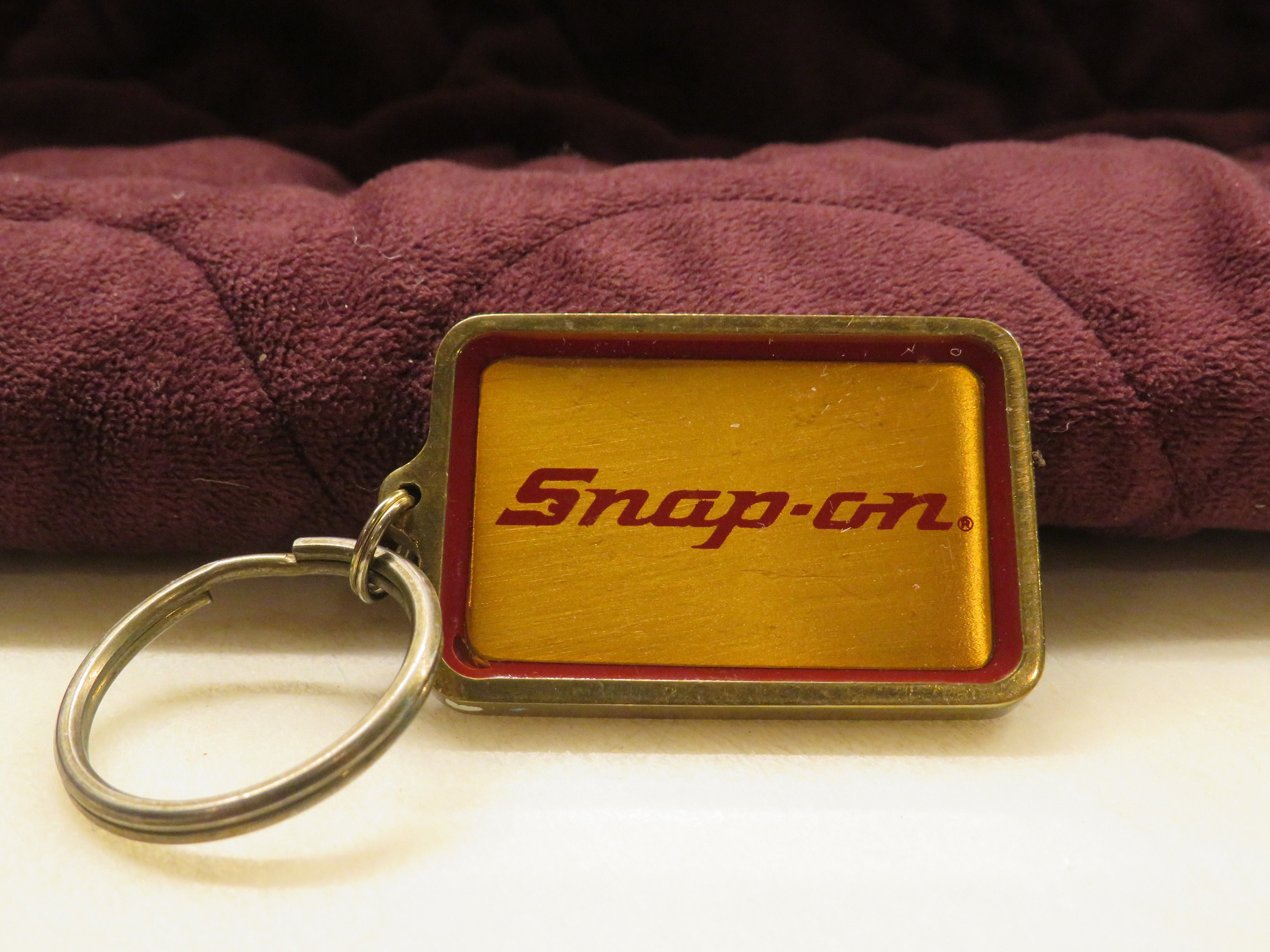 Snap on key ring clearance