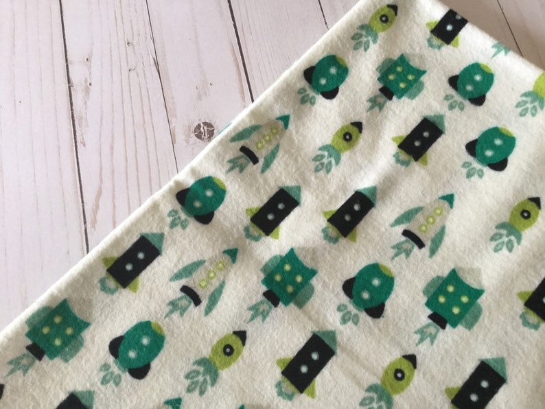 Green spaceship print flannel receiving blanket