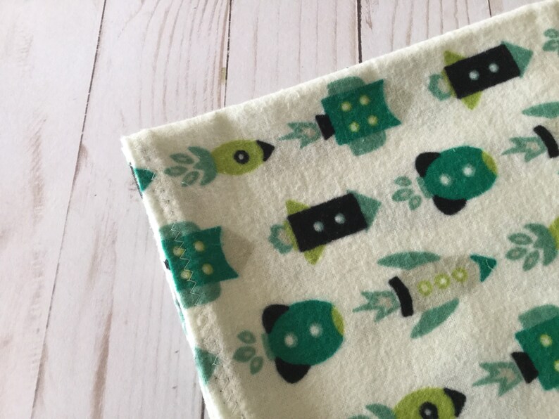 Green spaceship print flannel receiving blanket